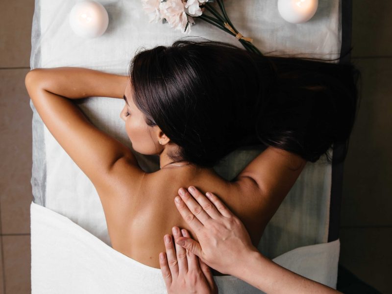 beautiful asian woman s body back pink nail gray background min